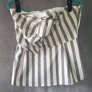 White, black and grey strapless top. Size medium from new York and Company.